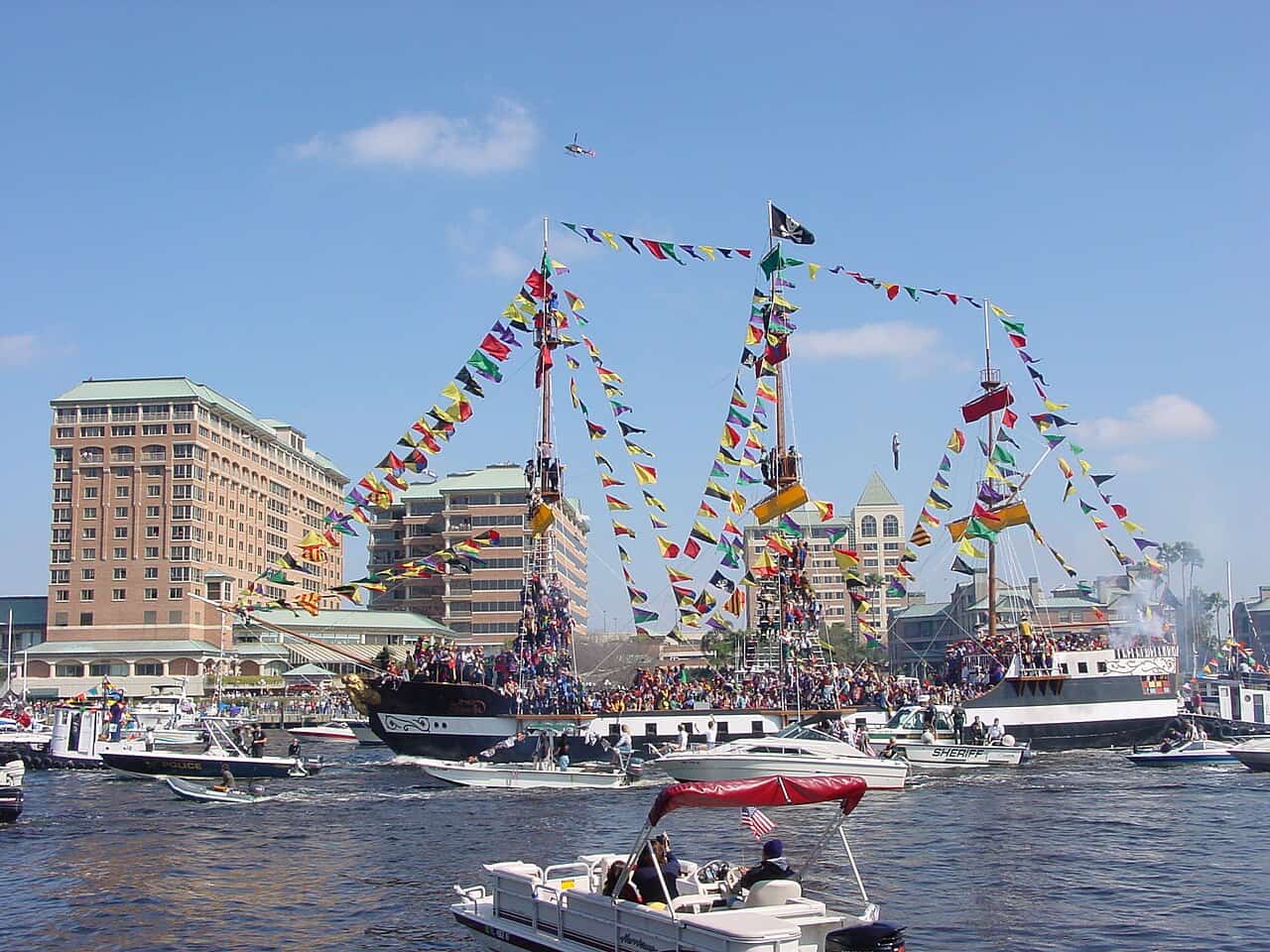 Pirate flagship sailing into Tampa Bay during Gasparilla Pirate Festival parade.