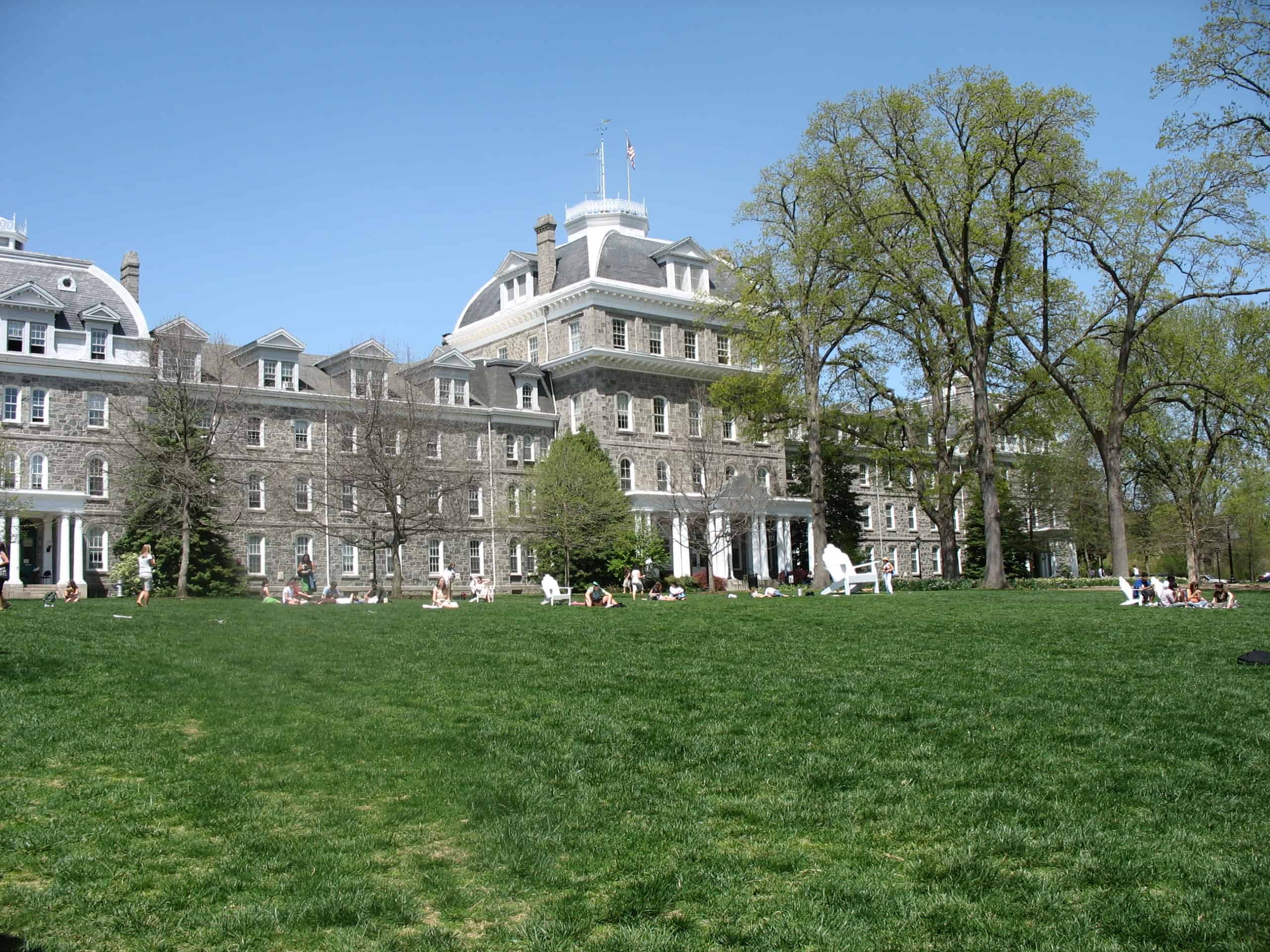Parrish Hall historic academic building with green lawn at Swarthmore College in Pennsylvania.